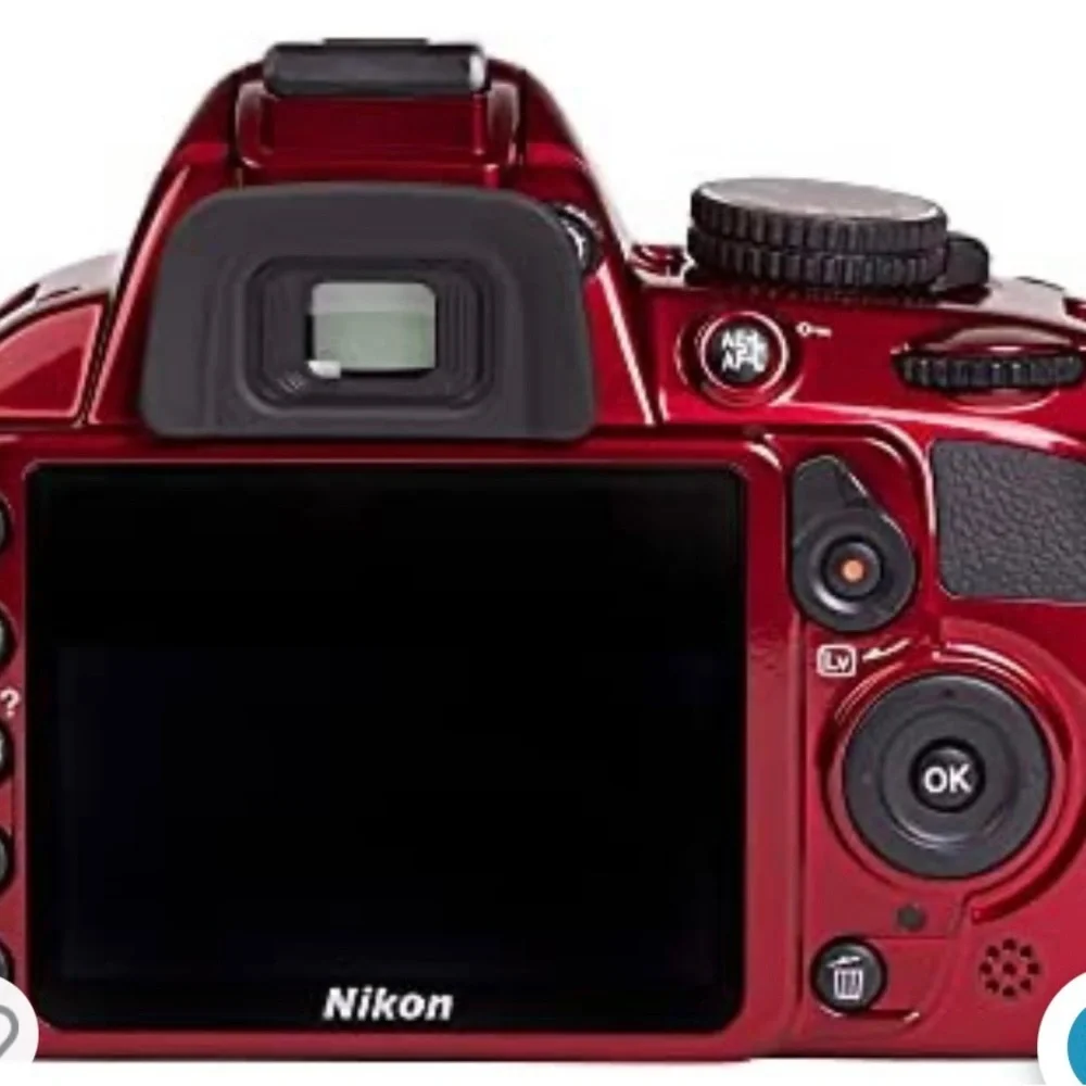Cranberry Red Nikon digital camera with different size lense 2 battery w/charger